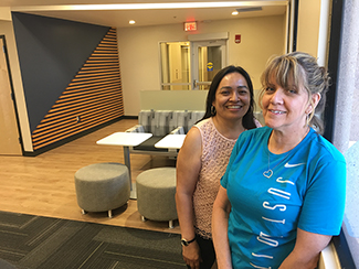 Claudia Duran and Sharon Bolin tour the new office space on the renovated Suite 6401
