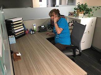 Medical Education Office admin Sharon Bolin got an early start on her move