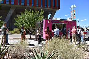 [People line up at the Ensenada Street Food truck for meat and vegetarian tacos and burritos at the Hispanic Heritage Month Celebration.]