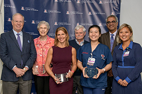 Dr. Irv Kron (left) and Ali Min (right) with Mentorship Award winners