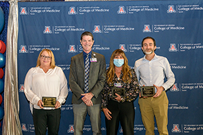 Pictured for clerkship recognition were (from left) OB-GYN’s Julie Tary, recognized for administrative support; presenter Dr. Kevin Moynahan; Medicine Clerkship director Amy Sussman, MD; and Kareem Shehab, MD, Pediatrics Clerkship director, who shared Outstanding Clinical Instructor in Clerkship honors with Dr. Sussman.