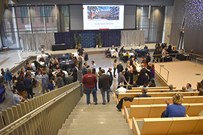 [People gather in HSIB Forum for UArizona College of Medicine – Tucson Faculty Awards Ceremony]