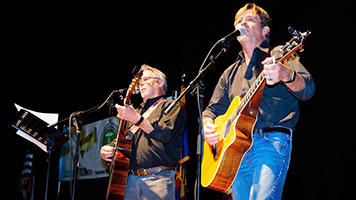 Dr. Peter Ott (right) on guitar with Ruff Mixx at the 2019 Women of Influence Awards hosted by Inside Tucson Business at the Desert Diamond Center in Sahuarita