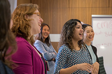 Drs. Holly Bullock, Allie Min, Salma Patel and Lora Wang participate in an icebreaker exercise.