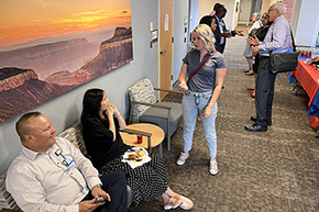 [From left, Julio Valencia, Phet Chen and Nicole Contreras were among those mixing it up at the 2023 Fall DEI Mixer hosted by the Department of Medicine on Aug. 25.]