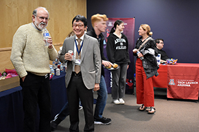 [Dr. John Galgiani (left) and Dr. James Liao (2nd from right) with Dr. Debra Stern (in red pants) after Dr. Liao’s Friday Frontiers in Biomedical Science address.]
