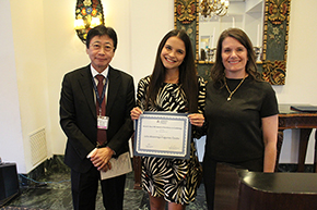 [Presented with a Zenas B. Noon MD Award of Excellence in Cardiology is student Julia Alvarenga Fagunes Couto (center), with DOM chair Drs. James Liao and Elizabeth Juneman, interim Cardiology chief and interim Sarver Heart Center director.]