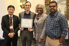 [Brandon Witten, MD (center), winner of the Outstanding Resident in Gastroenterology and Hepatology Award, with the GI division chief Drs. Juanita Merchant and Avin Aggarwal, who are GI fellowship director and associate program director (right), and DOM Chair Dr. James Liao (left).]