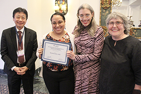 [Winner of the Lois Estok Award Outstanding Resident in General Internal Medicine, Natalie Davis, MD (center), with DOM Chair Dr. James Liao (left), and presenters (on right) Dr. Amy Klein, Hospice & Palliative Medicine Fellowship director, and Dr. Julia Jernberg, director, Health & Societies Thread, DOM.]