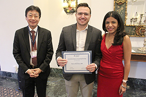 [Winner of the Outstanding Resident in Hematology & Oncology Award, Aaron Bertolo, MD, with presenter (on right) Hem-Onc division chief Dr. Rachna Shroff, and DOM Chair Dr. James Liao (left).]