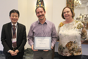 [Skyler Trieu, MD (center), winner of the Outstanding Resident in Infectious Diseases Award, with presenter and Infectious Diseases division chief Liz Connick, MD (right), and DOM Chair Dr. James Liao (left).]