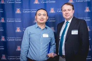 [Jianqin Lu, PharmD, PhD, and Steffan Nawrocki, PhD]