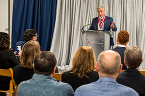 [Hesham Sadek, MD, PhD, Cardiology division chief and Sarver Heart Center director, makes a point during comments at his investiture ceremony.]