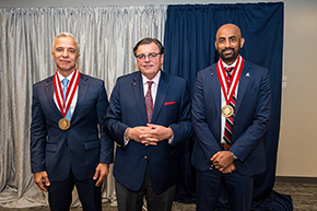 [After the investiture: Hesham Sadek, MD, PhD, Cardiology division chief and Sarver Heart Center director; College of Medicine – Tucson Dean Michael Abecassis, MD, MBA; and Sakthivel Sadayappan, PhD, chair, Department of Cellular & Molecular Medicine, and associate director, Sarver Heart Center.]