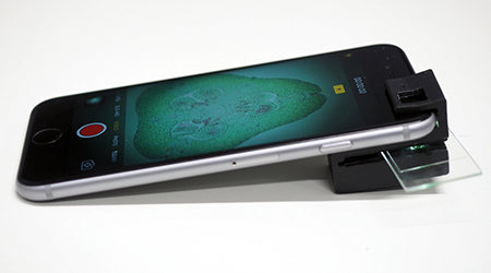 An example of a smartphone microscope attachment (Photo courtesy of CNBP) 