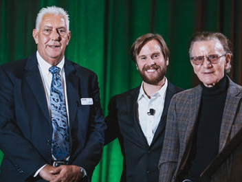 Dr. David S. Alberts, right, was honored with the Lifetime Achievement Award. Included in the photo is Jason Joseph, president and publisher of Tucson Local Media (left), and the event emcee, David Teeple, MD. 