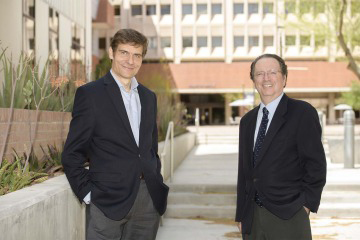 [Stefano Guerra, MD, PhD, MPH, and Fernando Martinez, MD, oversee the Tucson Children’s Respiratory Study, which is entering its fifth decade of research into childhood asthma and wheezing. (Photo by Kris Hanning, UArizona Health Sciences Office of Communications)]