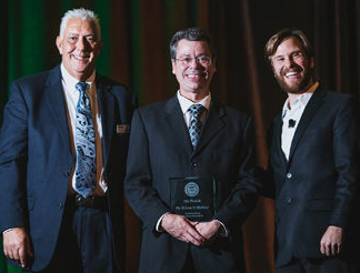 Dr. Brian S. McKay (center) received the Outstanding Medical Research Award.