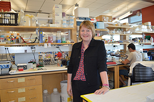Heddwen Brooks, PhD, in lab at BIO5 Institute