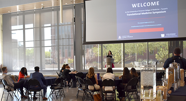 [Dr. Jennifer Carew offers the welcoming address at the Translational Medicine Symposium, which she hosted in March in the HSIB Forum. (Photo by David Mogollon, Department of Medicine)]