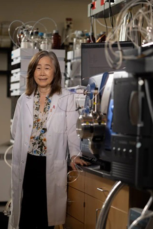 [Sherry Chow, PhD, in her lab at the U of A Cancer Center.]