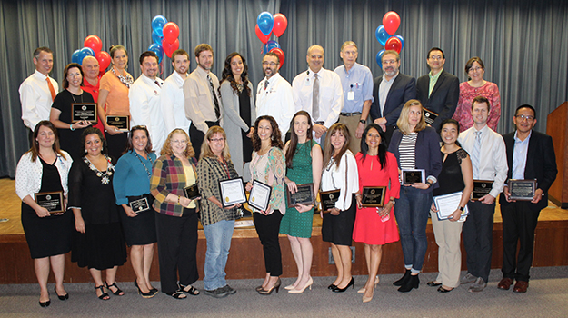Group shot of COM - Tucson Faculty Teaching Award winners