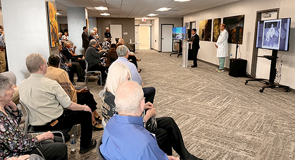 [Drs. Jim Liao and Joe Alpert, current and a prior chair of the Department of Medicine, address attendees of memorial for the late Drs. Jim Dalen and Jay Smith, former dean and vice dean of the College of Medicine – Tucson, who died within weeks of one another]