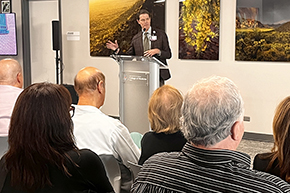 [Dr. Kevin Moynahan (at podium) at Dalen-Smith Memorial.]