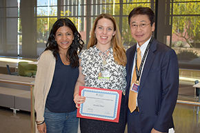 Kendra Marr (center, holding certificate), winner of the 2023 Hematology & Oncology Award for Outstanding Medical Student, with Rachna Shroff, MD, MS, interim chief of the Hem/Onc division, and Department of Medicine Chair James Liao, MD.