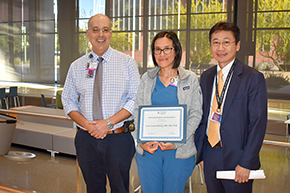 Lucia Luna Wong, MD, MS, PhD (center), winner of the 2023 Outstanding Resident Award in Infectious Diseases, with Tirdad Zangeneh, DO (left), director, Infectious Disease Transplant Program and associate director of Internal Medicine Residency Program, and Department of Medicine Chair James Liao, MD.