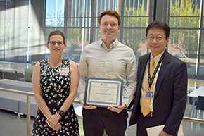 Brendan Andres, MD (center), winner of the 2023 Internal Medicine Residency Program Director’s Award for Outstanding Humanism & Professionalism, with Laura Meinke, MD (left), associate professor and Internal Medicine Residency Program director, and Department of Medicine Chair James Liao, MD.
