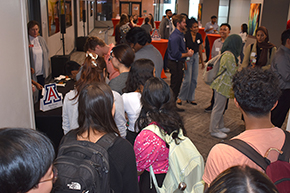 [Pre-med and medical students and others stack up at the COM-T Social Hall entrance to sign-in and fill out nametags at an Internal Medicine Student Meet-and-Greet, hosted by the IM Residency Program on Sept. 11, 2024.]