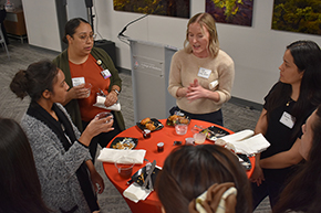 [Chief residents Drs. Natalie Davis and Elise Le Cam (top center) tell students what it was like when they were doing clerkships and sub-internships during an Internal Medicine Student Meet-and-Greet hosted in the COM-T Social Hall, Sept. 11, 2024.]