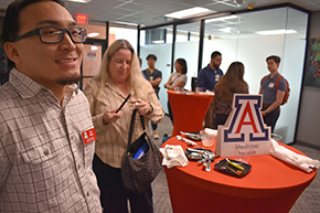 [Tyler Wong, Ambulatory Medicine Clerkship coordinator, and Kristina Waters, senior program coordinator for the Internal Medicine Clerkship, at the Internal Medicine Student Meet-and-Greet.]