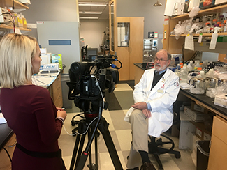 Dr. John Galgiani being interviewed on new Valley fever clinical practice by KGUN9's Natalie Tarangioli
