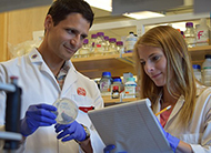 Brittany Forte (right) works in the lab of Samuel Campos (left), associate professor in the Department of Immunobiology and Cancer Biology Graduate Interdisciplinary Program.