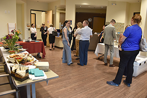 The open house begins with a social mixer, including refreshments and snacks.