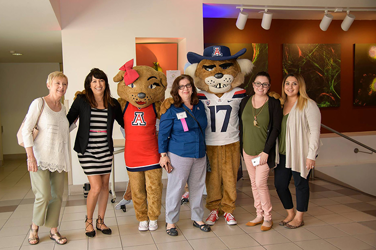 Joining Helen Hill, the Department of Medicine nominee (center), for a pre-event photo with Wilma and Wilbur Wildcat, are fellow pulmonary admins and coordinators, Carol DeBis-Harrell, Brenda Lambert, Sarah Munoz and Jacque Carrillo.