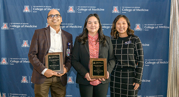 Pictured in March receiving 2023 Graduate Medical Education Excellence Awards are Cardiology’s Olivia Hung, MD, PhD (center), with Bujji Ainapurapu, MD (left), of the Division of Inpatient Medicine, presented by Allie Min, MD, College of Medicine – Tucson assistant dean for faculty affairs.
