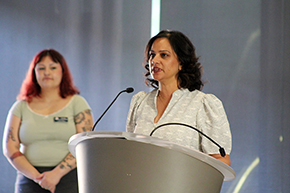 [Internist and GGP division’s Indu Partha, MD (at podium), presents the honors on behalf of the U of A College of Medicine – Tucson’s Academy of Medical Education Scholars, or AMES, chapter. Dr. Partha is the group’s vice chair.]