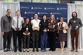 [Specialty Advisor Awards (left to right): Presenter Richard Amini, MD; Ophthalmology’s Roy Swanson, MD; Nephrology’s Amy Sussman, MD; Pediatrics’ Kareem Shehab, MD; Emergency Medicine’s Elaine Situ-LaCasse, MD; Neurosurgery Chair Julie Pilitsus, MD, MPH, MBA; Family Medicine’s Sommer Aldulaimi, MD; and GGP’s Kristopher Abbate, MD.]