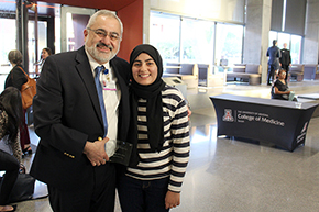 [Nephrology division chief Bekir Tanriover, MD, MBA, with his daughter after the COM-T Faculty Awards ceremony.]