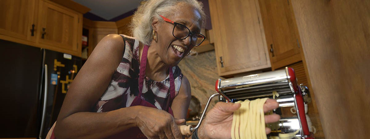 [When Juanita Merchant, MD, PhD, threw a recent dinner party, she recreated a meal she’d made in Sicily, complete with homemade pasta. (Photo courtesy of UArizona Health Sciences, Kris Hanning)]