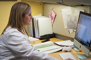 Dr. Ledford works with clinical partner Monica Kraft, MD, on her asthma research.