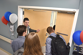 Dr. Kevin Moynahan leads a tour of patient rooms