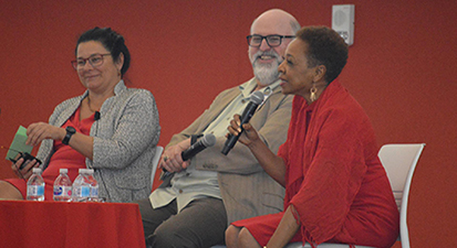 David Marrero, PhD (center), and Linda Dingle, RN, CDE (holding microphone) answered questions during a Q&A session moderated by Dr. Nancy Sweitzer.