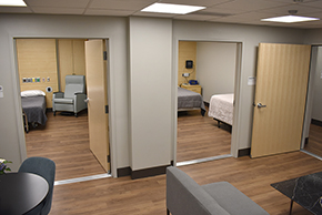Two rooms in a sleep suite with a shared living room for research patients at the Center for Sleep, Circadian Rhythm and Neuroscience Research
