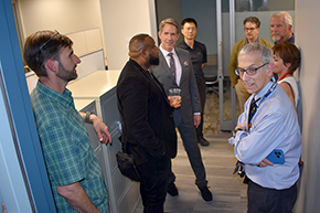 Among those gathered in the center's large breakroom with an open-office area for researchers to use while conducting studies are: Regents Professor Marvin Slepian, MD, JD (blue shirt on right); Maria Altbach, MD (behind Dr. Slepian), co-chair of the Dean's Research Council; Jordan Karp, MD (in back with glasses), chair, Department of Psychiatry; and Scott Kilgore, PhD (3rd from left), a sleep researcher in Psychiatry and center member