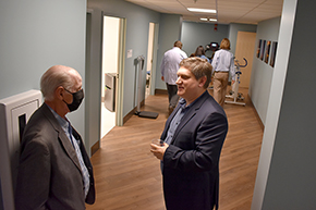 Sleep center member Michael Grandner, PhD (right), director of the Sleep and Health Research Program in UArizona Department of Psychiatry and the Behavioral Sleep Medicine Clinic at the Banner-University Medical Center, chats with a guest.