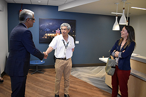 Dr. Stuart Quan (center) congratulates Dr. Sai Parthasarathy on the opening of the new sleep center while Dr. Patricia Haynes, a center researcher, looks on.